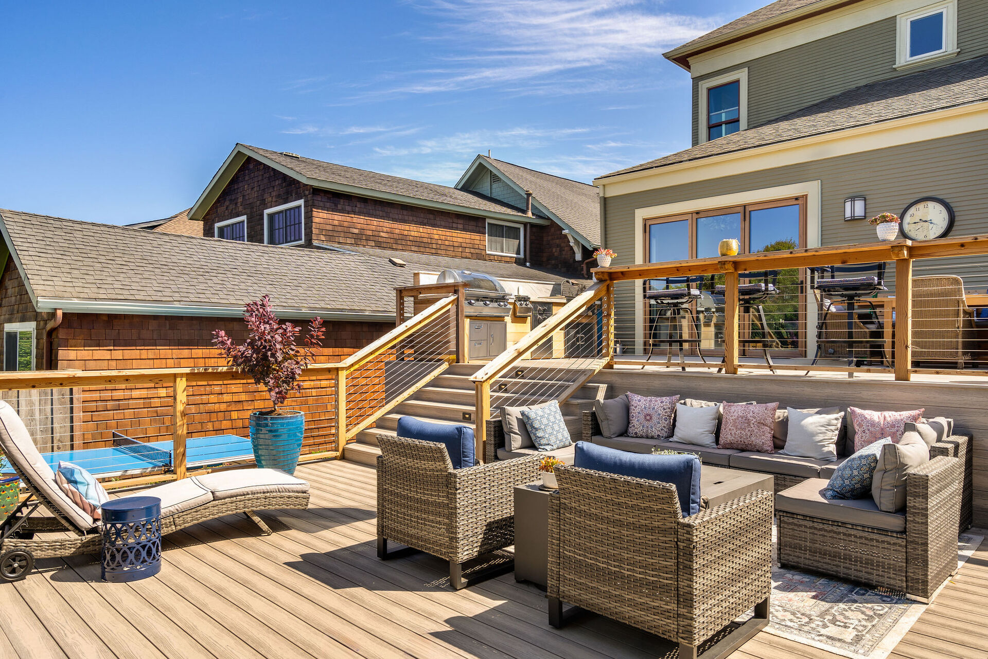 Custom large deck with high-end finishes at twilight
